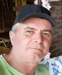 Imagem de um homem (Jessé da Silva Rangel, de 63 anos), usando boné.