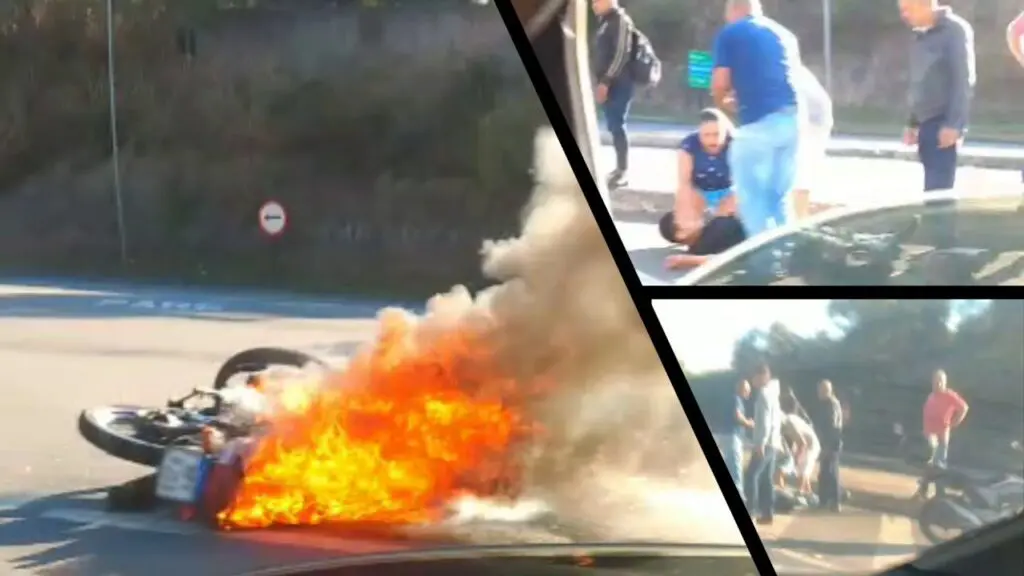 Vídeo: acidente entre veículos deixa motociclista ferido e moto em chamas na Serra Arte com 3 imagens na primeira uma motocicleta em chamas caída no chão após acidente na BR-101, na segunda e terceira imagem a vítima um motociclista, deitado na pista, rodeado por pessoas tentando prestar os primeiros socorros