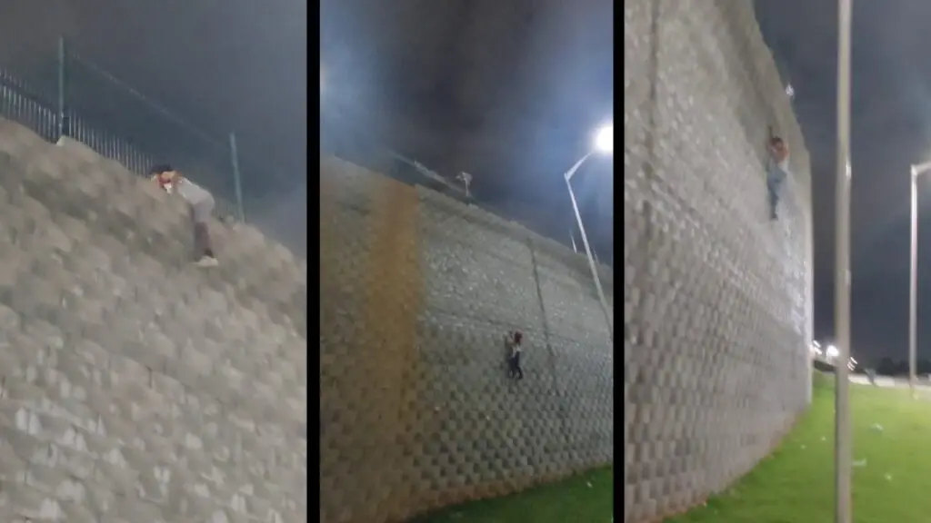 Vídeo: crianças são flagradas escalando um paredão do novo viaduto de Carapina Crianças escalando um muro em Carapina.