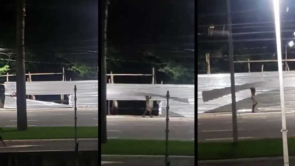 Sujeito é flagrado furtando placa de alumínio de obra na Serra.