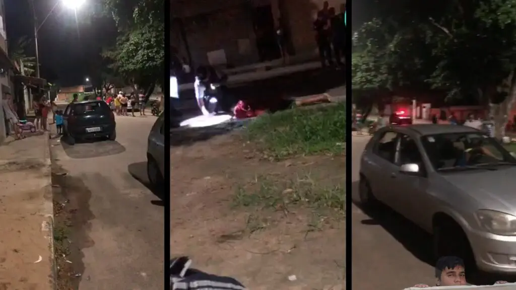 Dezenas de moradores curiosos acompanhando os trabalhos da pericia Polícia Cientifica.