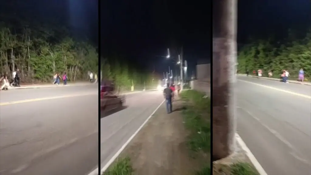 Após tiroteio em Balneário de Carapebus, ônibus do Transcol deixam de circular. Passageiros caminham até acessos ao bairro.