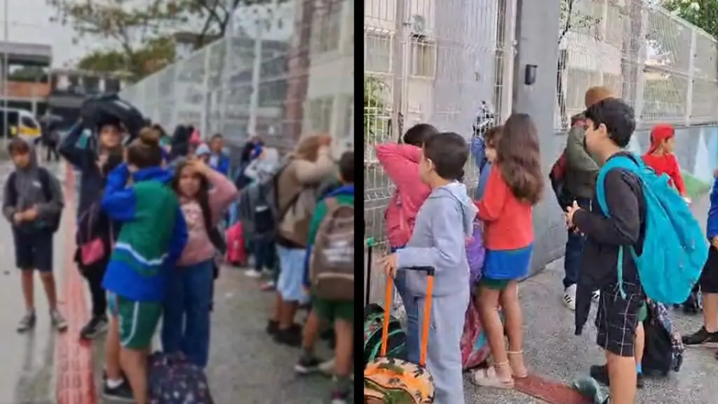 Crianças aguardaram na chuva em frente à Escola Abraão, em Barcelona (Serra), por conta de suposta proibição de entrada antes do horário