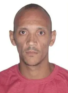 Foto do rosto de um traficante foragido da justiça (Jhonatan Ricardo Souza do Carmo).