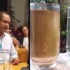 Arte com duas imagens, na primeira o gerente da CESAN, Carlos Augusto Dilem, Na 2º imagem um copo com água barrenta ao lado de outro copo com água limpa e cristalina