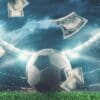 Foto bola de futebol com lucros obtidos em sites de apostas
