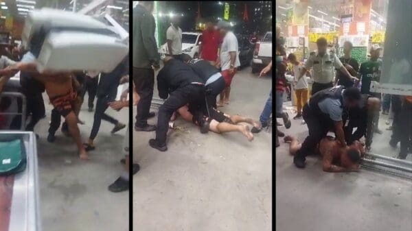 Imagens de um homem sendo agredido e depois imobilizado por clientes e funcionários de uma rede atacadista.
