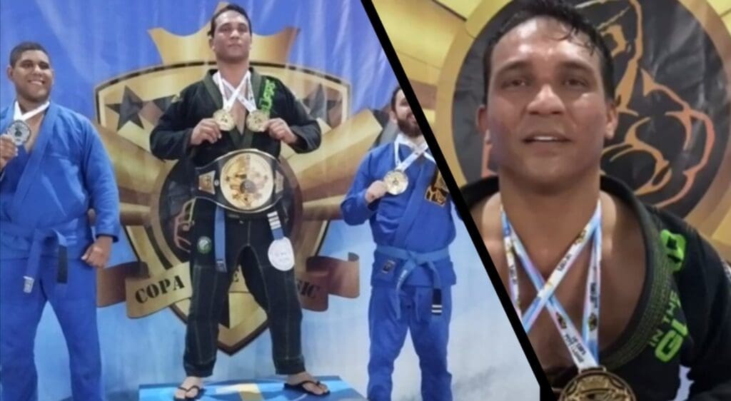 Lutador de Jiu-jitsu da Serra no pódio erguendo medalhas