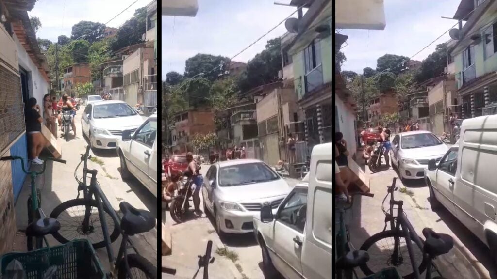 Cenário do crime ficou repleto de curiosos em Jardim Carapina, na Serra. Segundo testemunhas a vítima foi baleada por uma dupla de moto